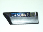 Znaczek modelu / nakładka LANCIA DELTA II 1,4 lewy - Emblem Logo - OE 82468214+7776596